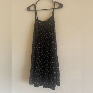 black with white and brown detail dress